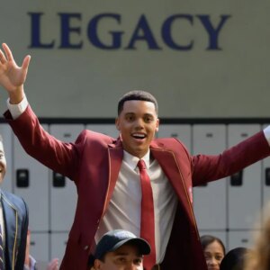 two young men celebrate at private school