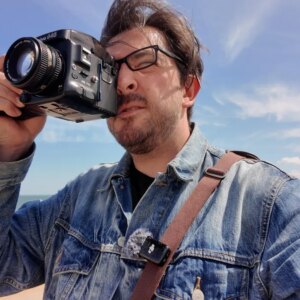 Image of a man holding a camera