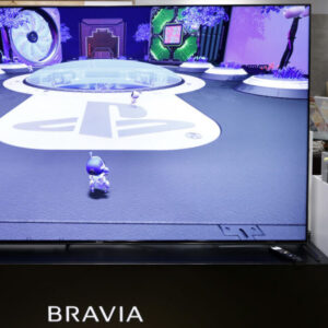 A Sony Group Corp. PlayStation 5 (PS5) video game console and a controller displayed next to a Bravia XR 4K television at the company's showroom inside the Ginza Place building in Tokyo, Japan, on Wednesday, Oct. 27, 2021.