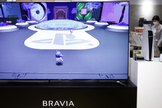 A Sony Group Corp. PlayStation 5 (PS5) video game console and a controller displayed next to a Bravia XR 4K television at the company's showroom inside the Ginza Place building in Tokyo, Japan, on Wednesday, Oct. 27, 2021.