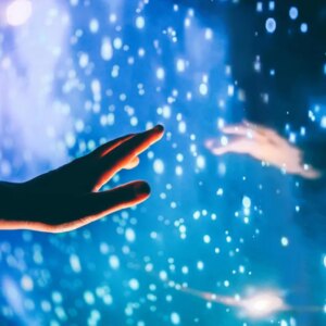 A human hand reaching out to the dark unknown, the dark matter