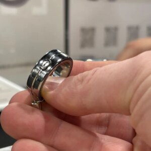 Display of several silver smart rings at CES