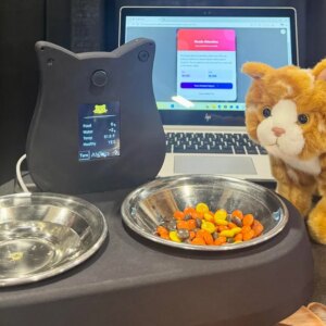 The AI Tails smart feeding and drinking station on a booth showcasing at CES Unveiled