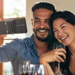 Couple taking a selfie using a phone in a Samsung Galaxy S21 FE case